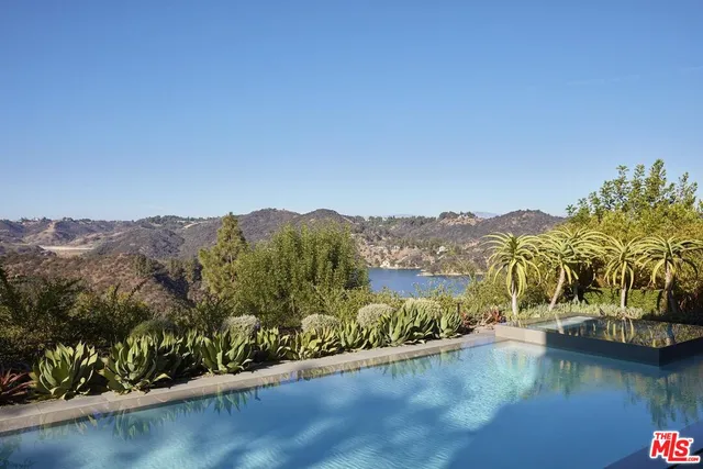 a view of a lake with a mountain in the background