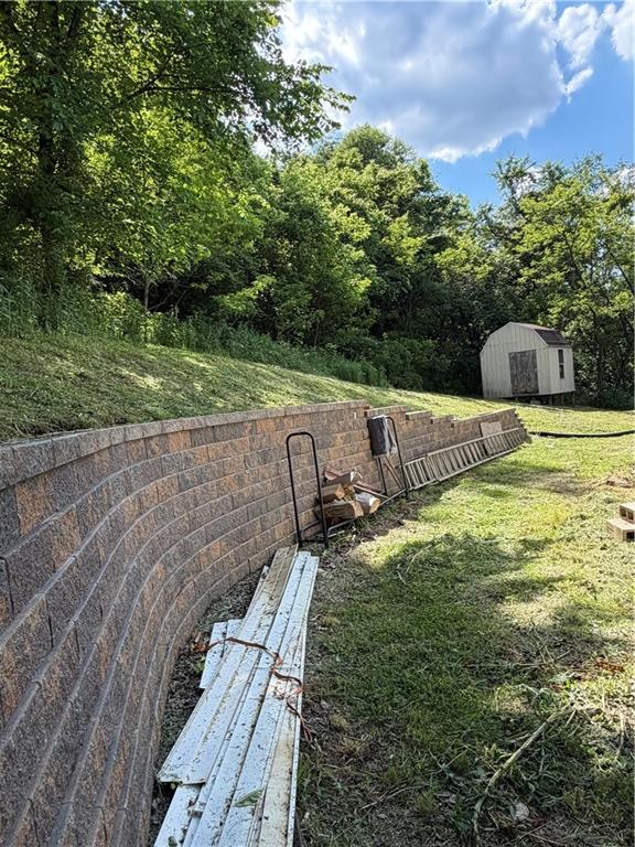 55 Pumpkin Center Road Finleyville, PA 15332 - Photo 3 of 29 a view of a lake with a yard