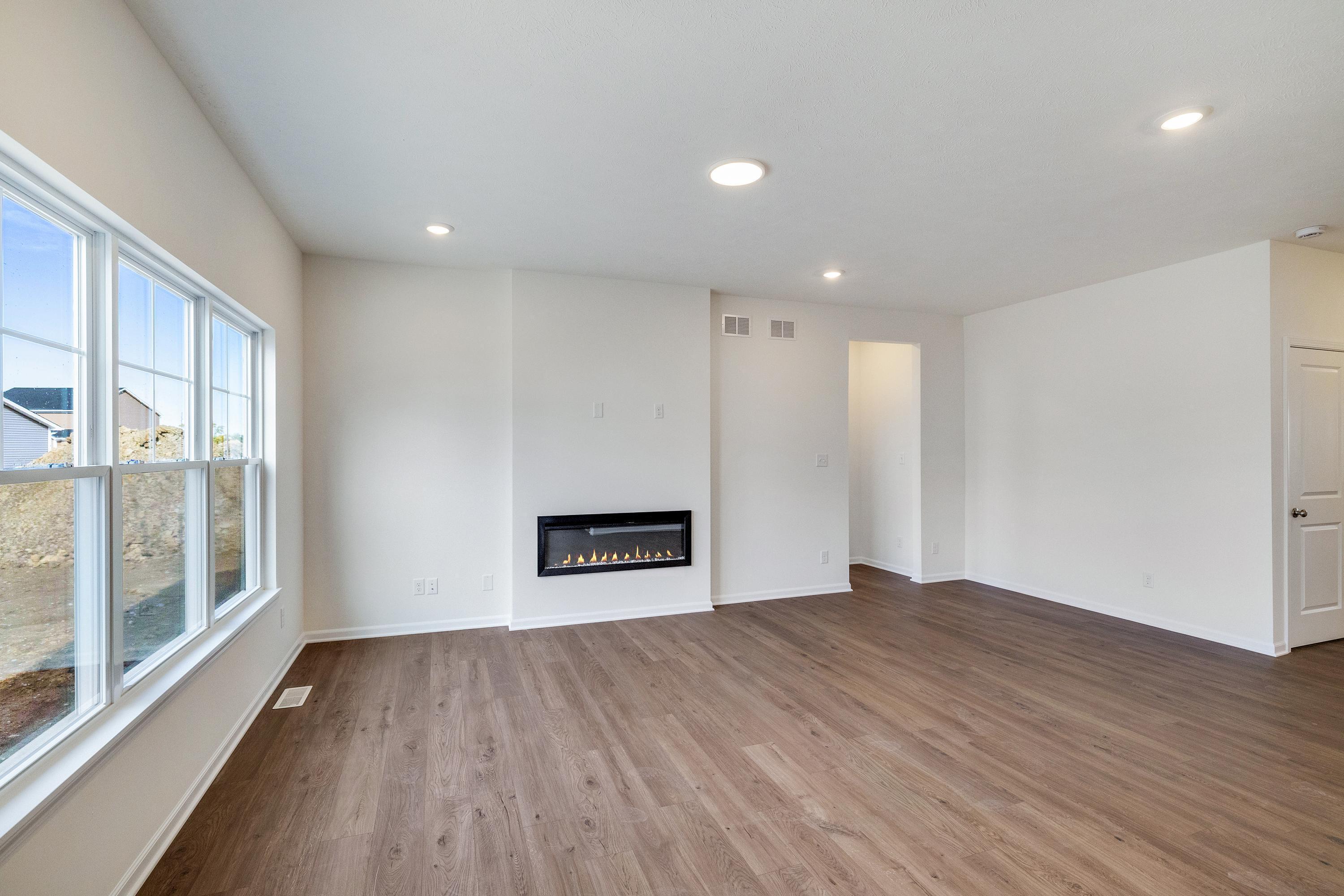 13070 Carolina Street Crown Point, IN 46307 - Photo 12 of 18 a view of empty room with wooden floor