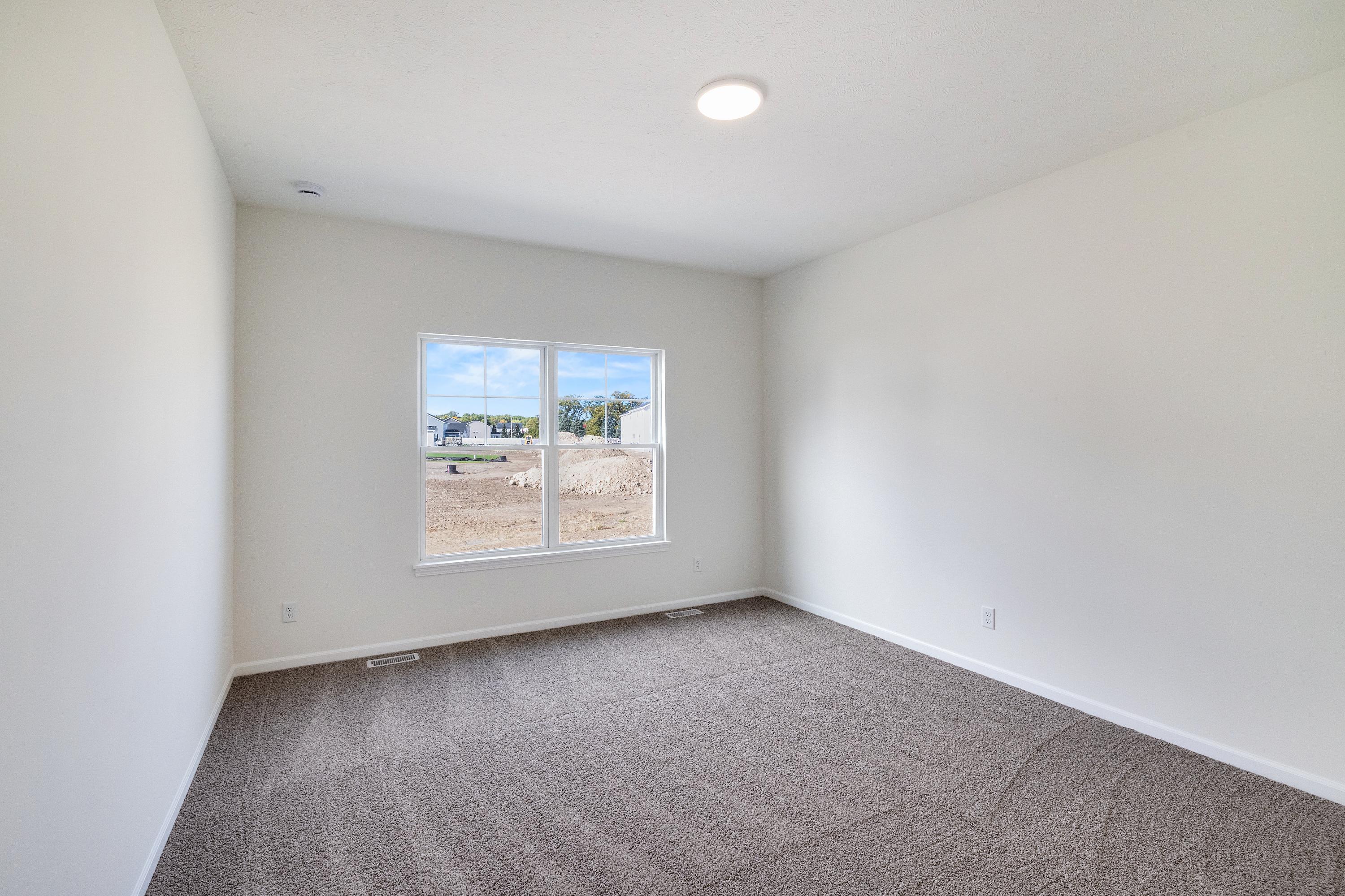 13070 Carolina Street Crown Point, IN 46307 - Photo 15 of 18 an empty room with a window