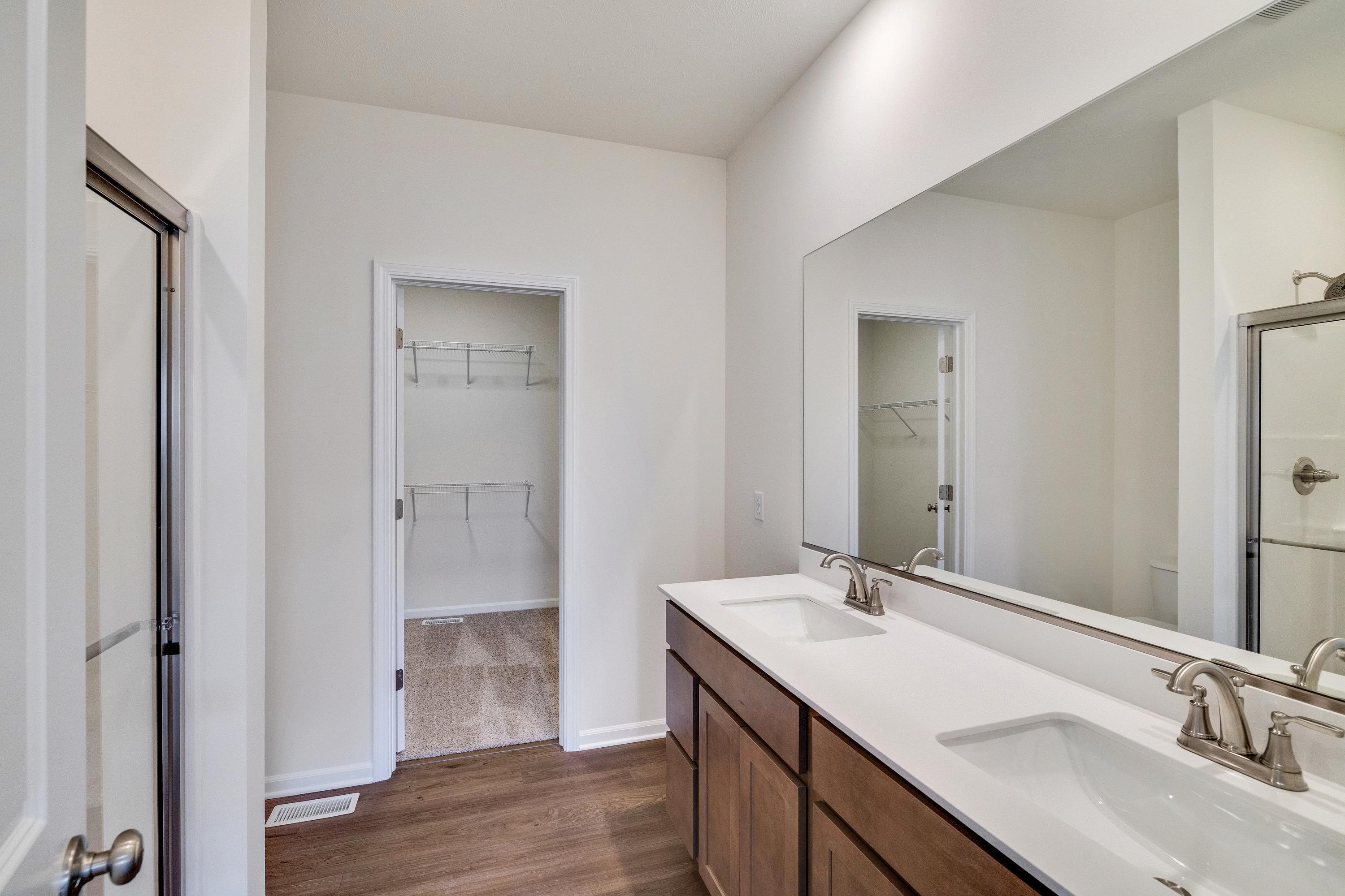 13070 Carolina Street Crown Point, IN 46307 - Photo 17 of 18 a bathroom with a sink and a mirror