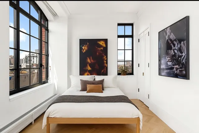 a terrace with outdoor seating and lots of trees