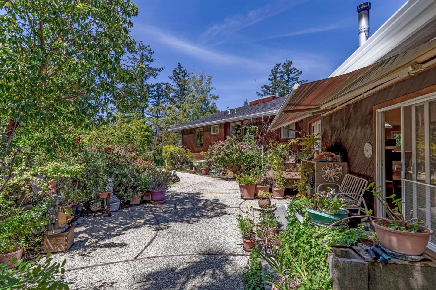 25149 Radonich Road Los Gatos, CA 95033 - Photo 27 of 47 a view of a house with potted plants