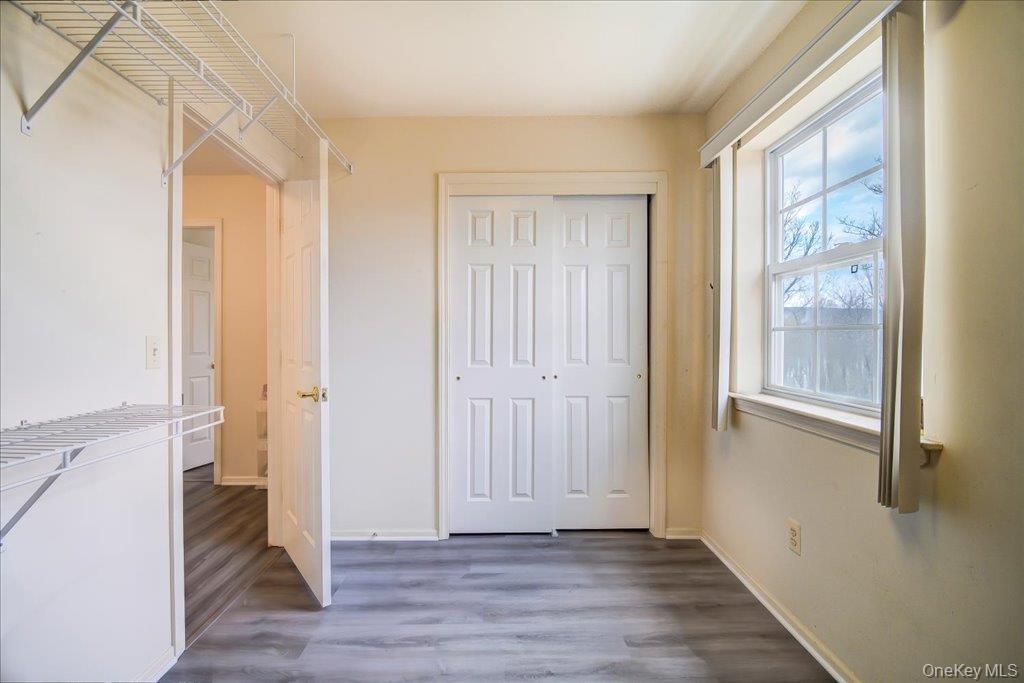 3 Emory Road Highland Mills, NY 10930 - Photo 25 of 42 different angle of 3rd bedroom Image has been modified using AI to reflect the home during the packing process