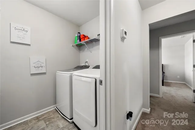 a storage room with washer and dryer