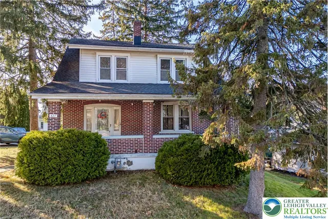 a view of a house with a garden