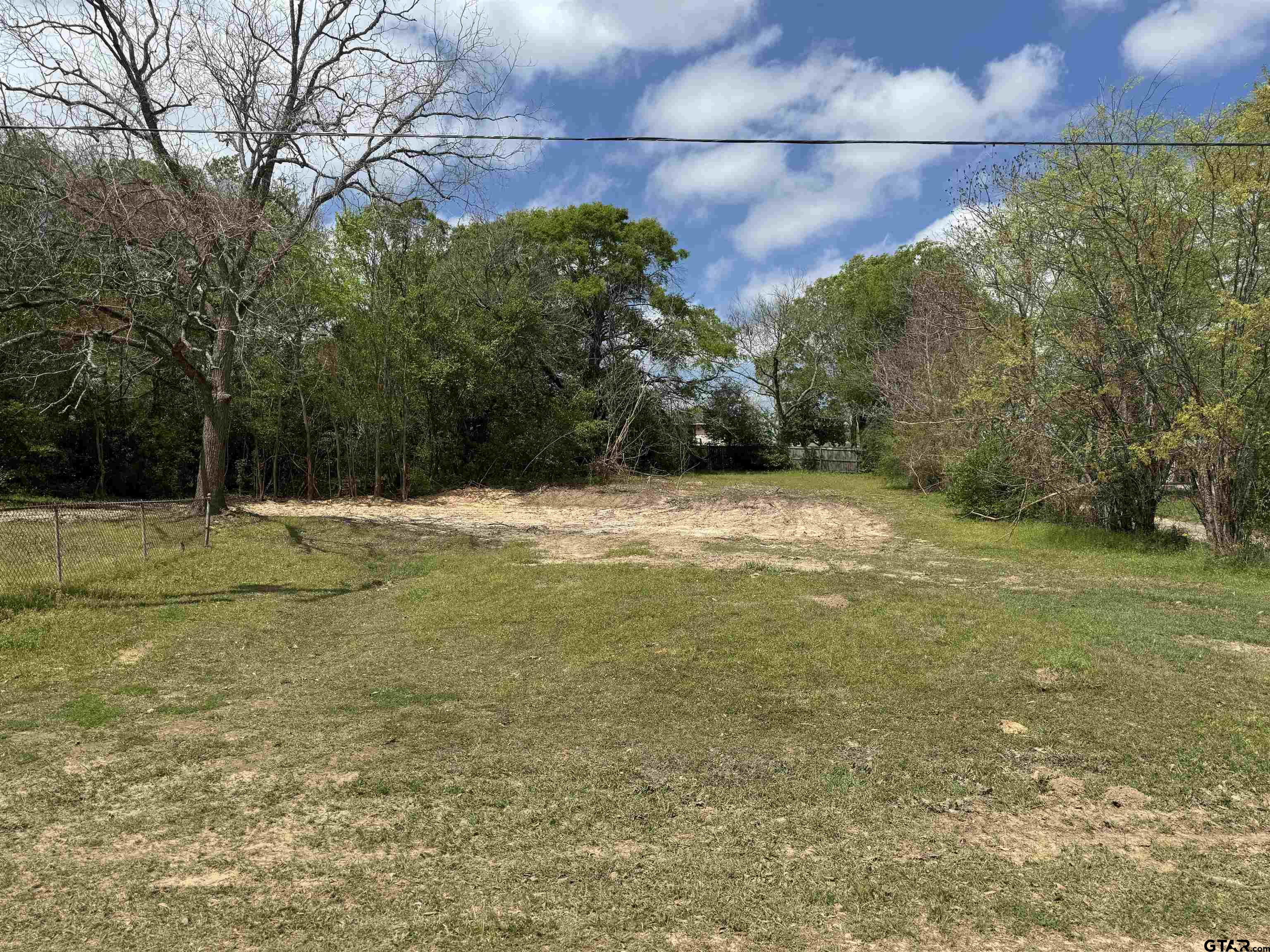 207 East Front Street Arp, TX 75750 - Photo 2 of 8 a view of a yard with a house