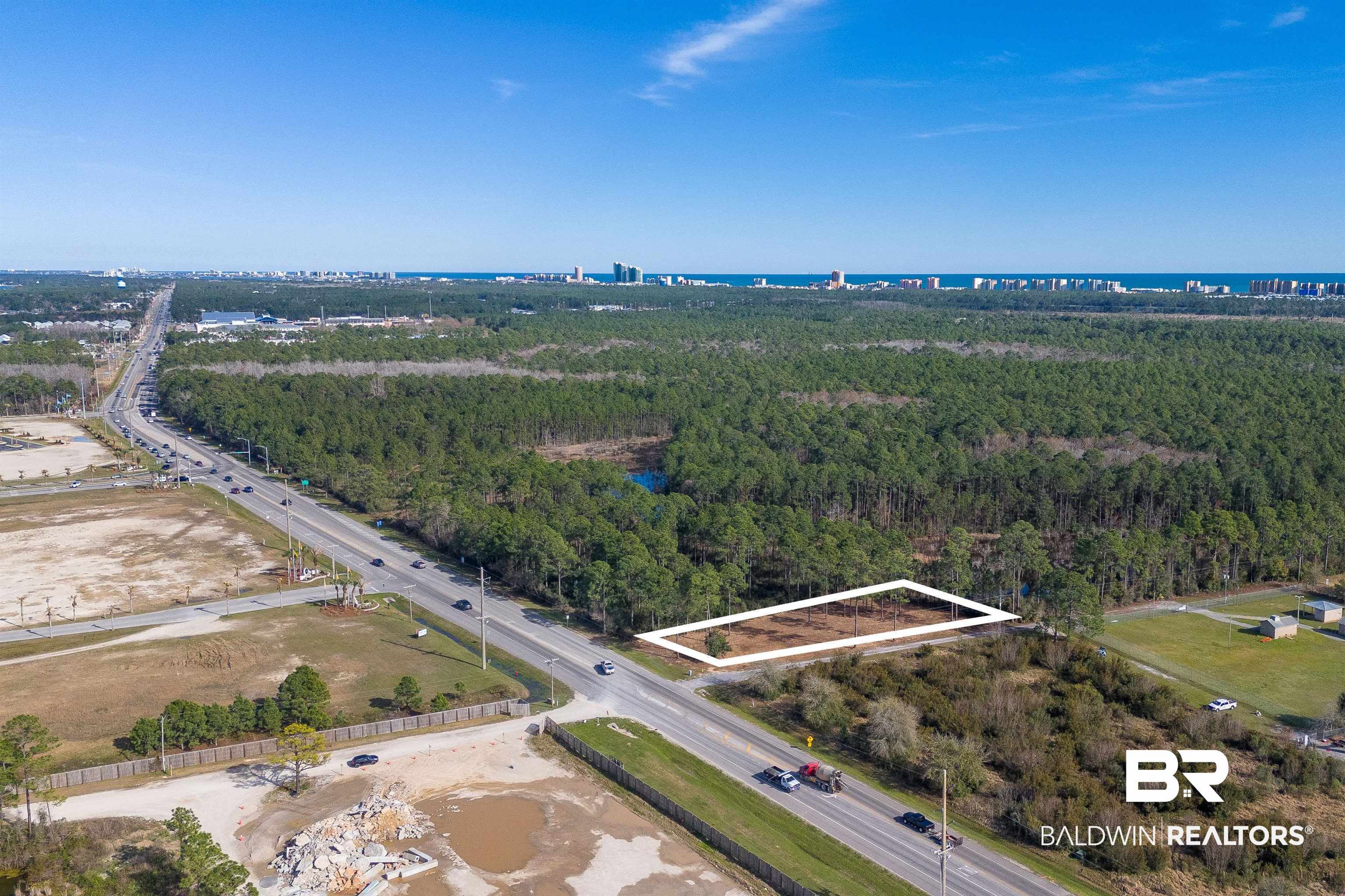 0 Canal Road Orange Beach, AL 36561 - Photo 15 of 25 Aerial view with a wooded view and a water view