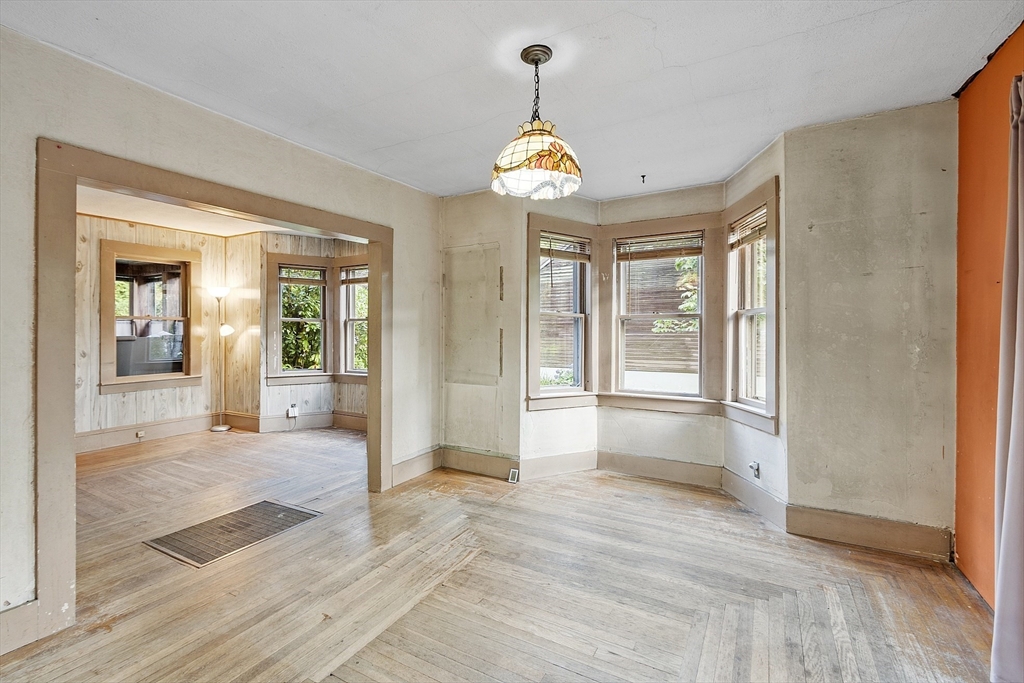 150 Brickyard Road Athol, MA 01331 - Photo 7 of 33 a view of an entryway with wooden floor and a chandelier