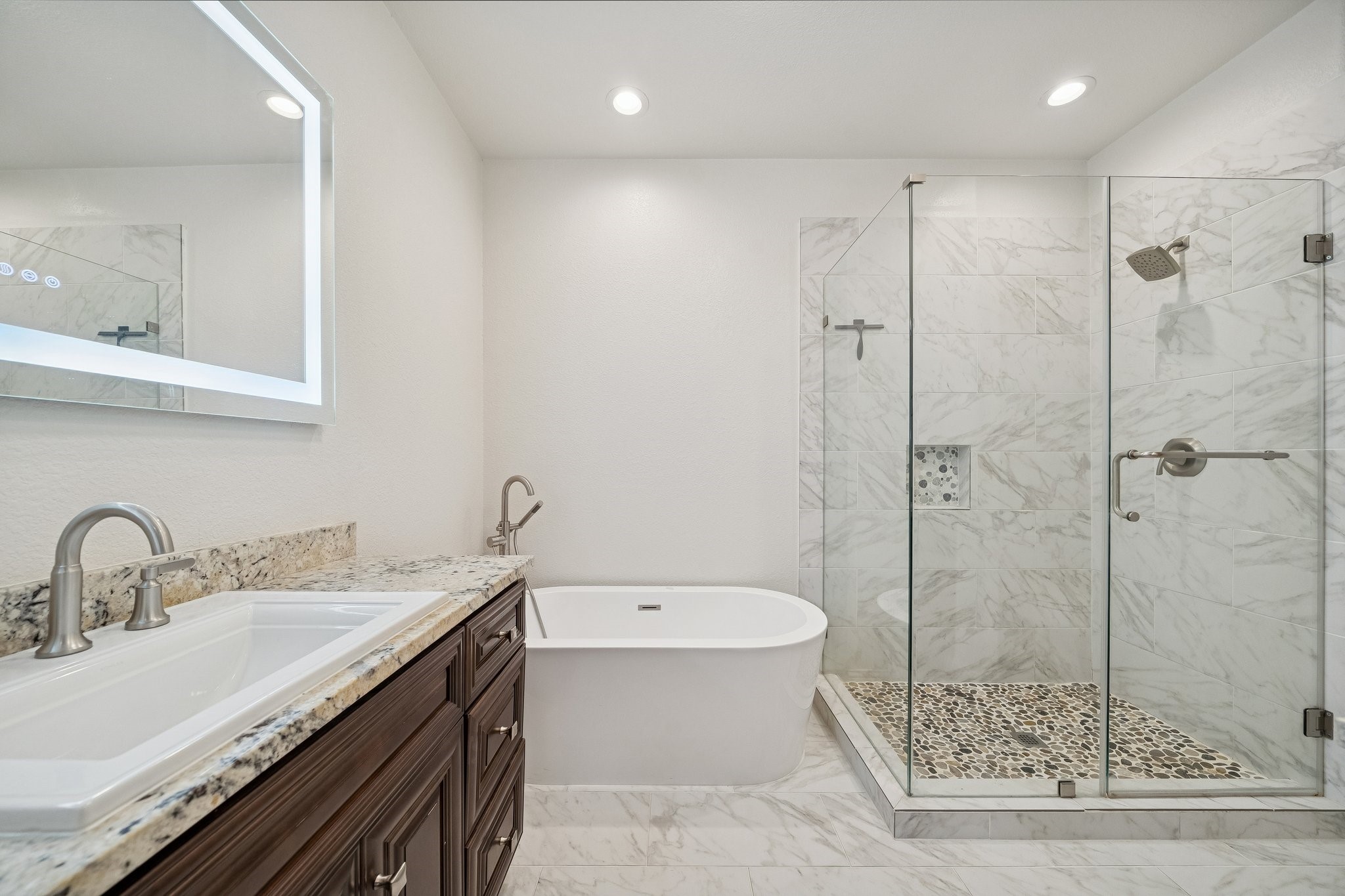 2741 Sherwin Street Houston, TX 77007 - Photo 11 of 21 a bathroom with a sink a toilet and shower
