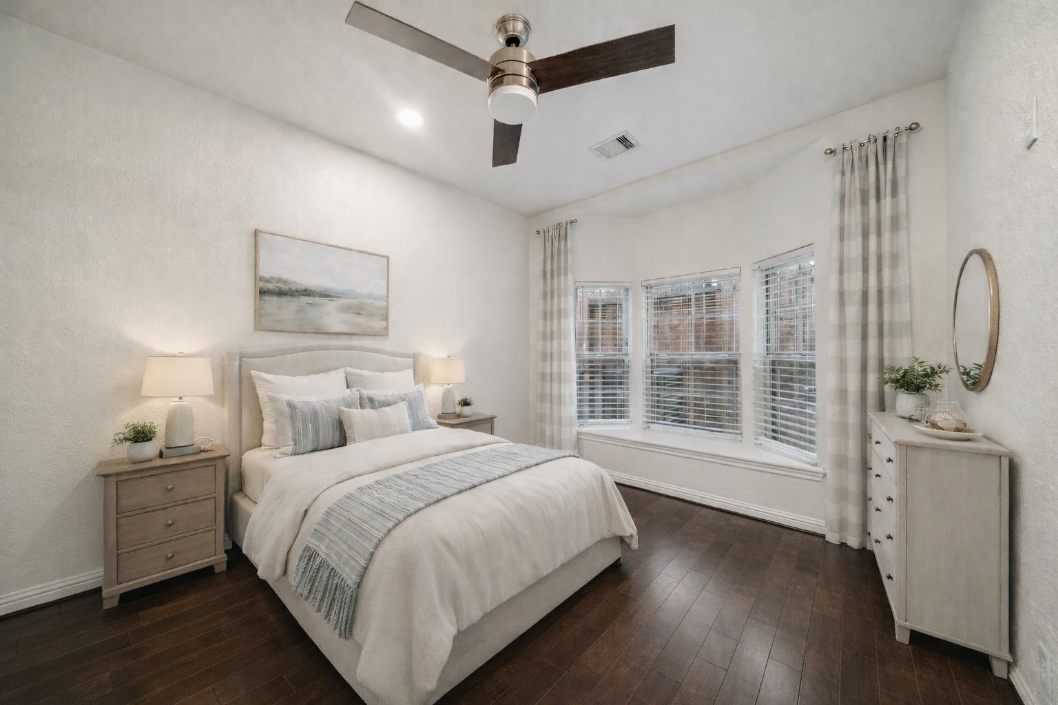 2741 Sherwin Street Houston, TX 77007 - Photo 14 of 21 a bedroom with a large bed and a tv on the dresser