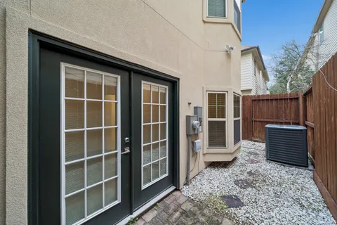a workspace with furniture and a potted plant