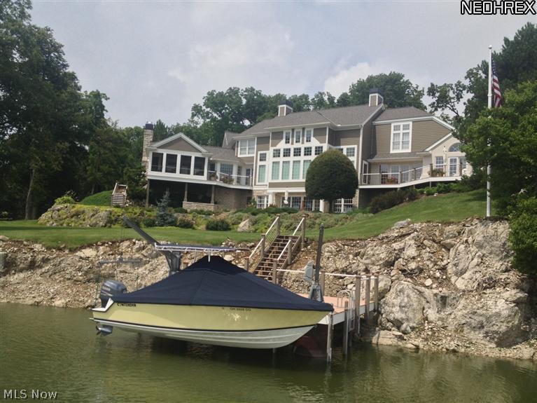 2730 North Bluff Ridge Drive Port Clinton, OH 43452 - Photo 1 of 25 This is the view of the Lake Erie side of this magnificent home. There is direct access to Lake Erie.