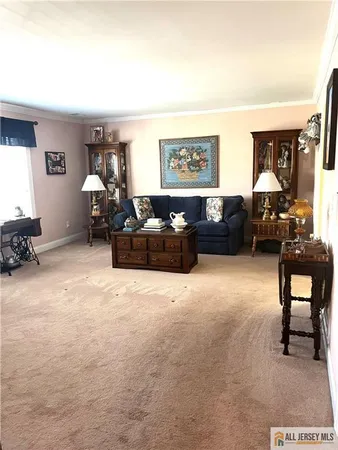 a bathroom with a shower sink and mirror