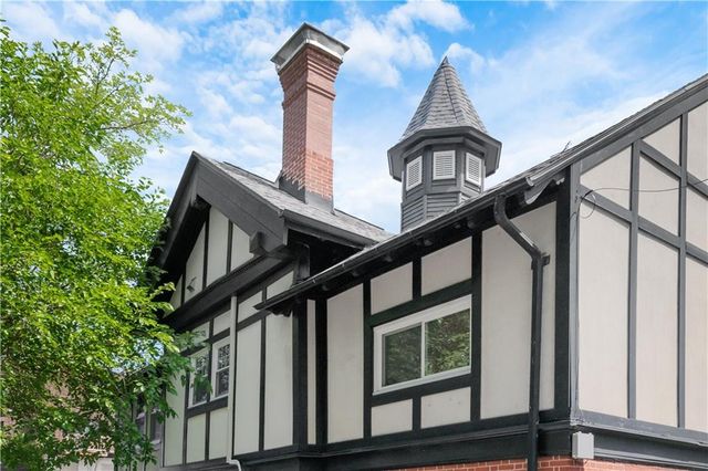 a front view of a house with a balcony