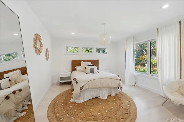 a bed room with a bed and a couch