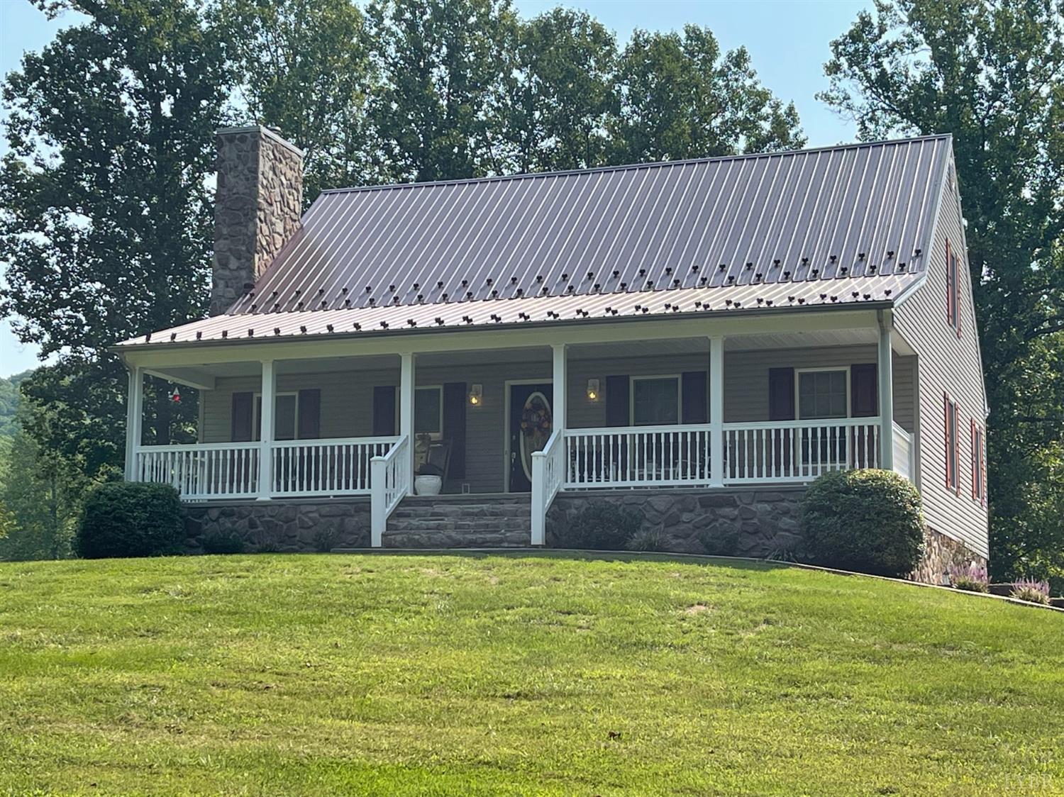 755 Bearfield Road Amherst, VA 24521 - Photo 1 of 98 a front view of a house with garden