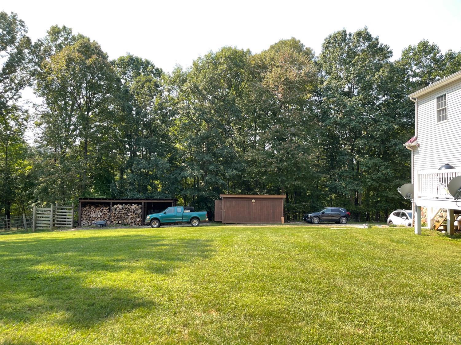 755 Bearfield Road Amherst, VA 24521 - Photo 14 of 98 a swimming pool with outdoor seating and yard