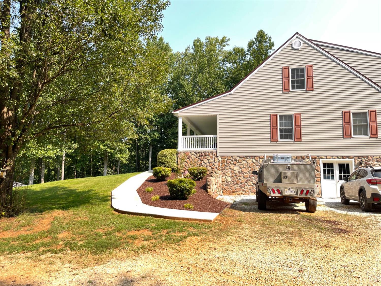 755 Bearfield Road Amherst, VA 24521 - Photo 19 of 98 a front view of a house with a yard