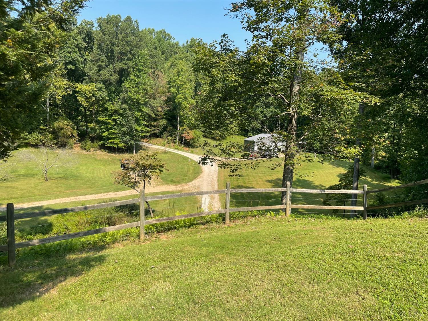 755 Bearfield Road Amherst, VA 24521 - Photo 25 of 98 a view of a swimming pool with an outdoor space and seating area
