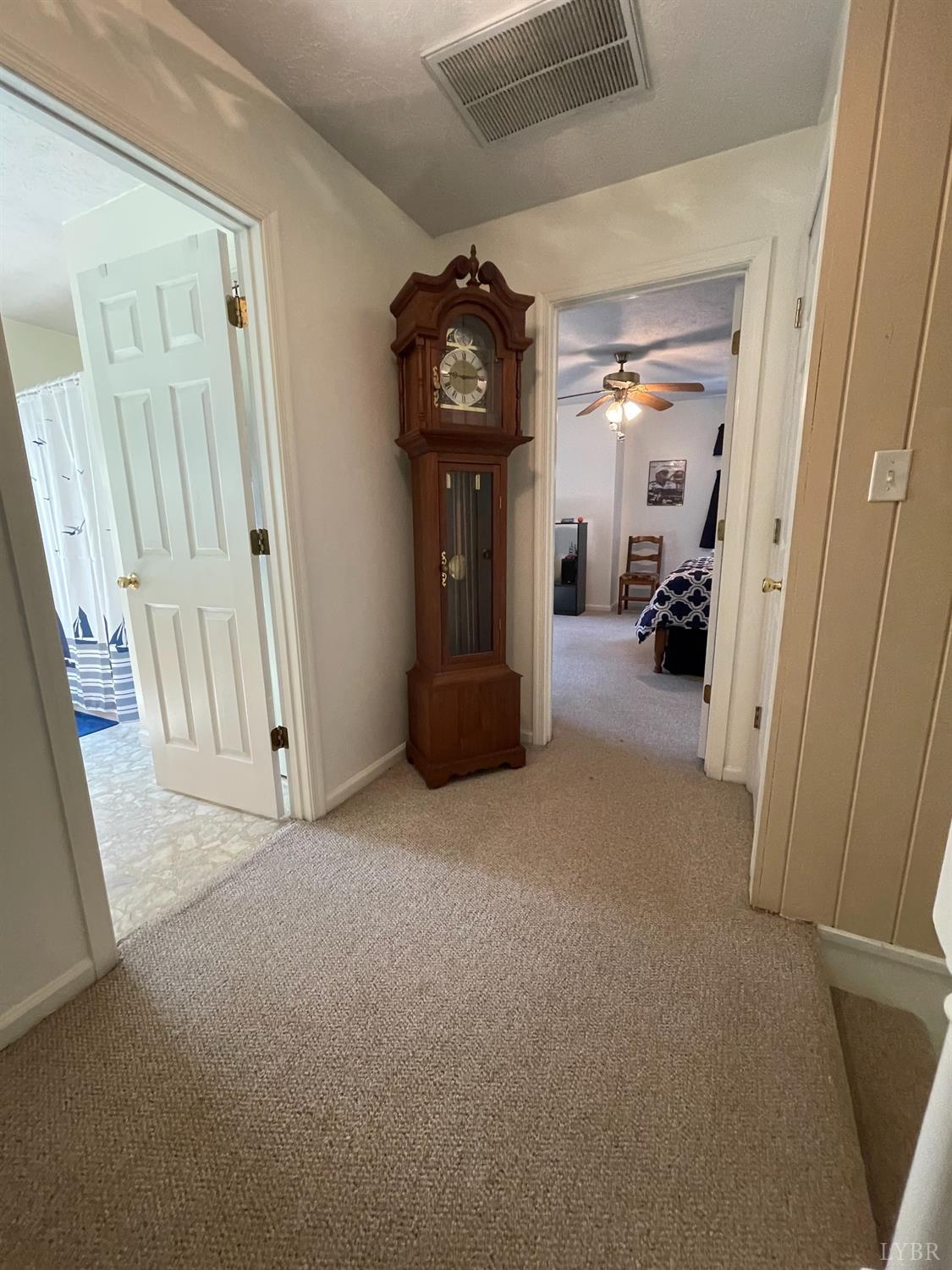 755 Bearfield Road Amherst, VA 24521 - Photo 56 of 98 a view of hallway with livingroom and stairs