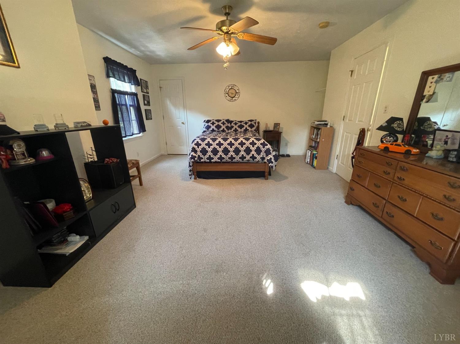 755 Bearfield Road Amherst, VA 24521 - Photo 57 of 98 a living room with furniture and a chandelier