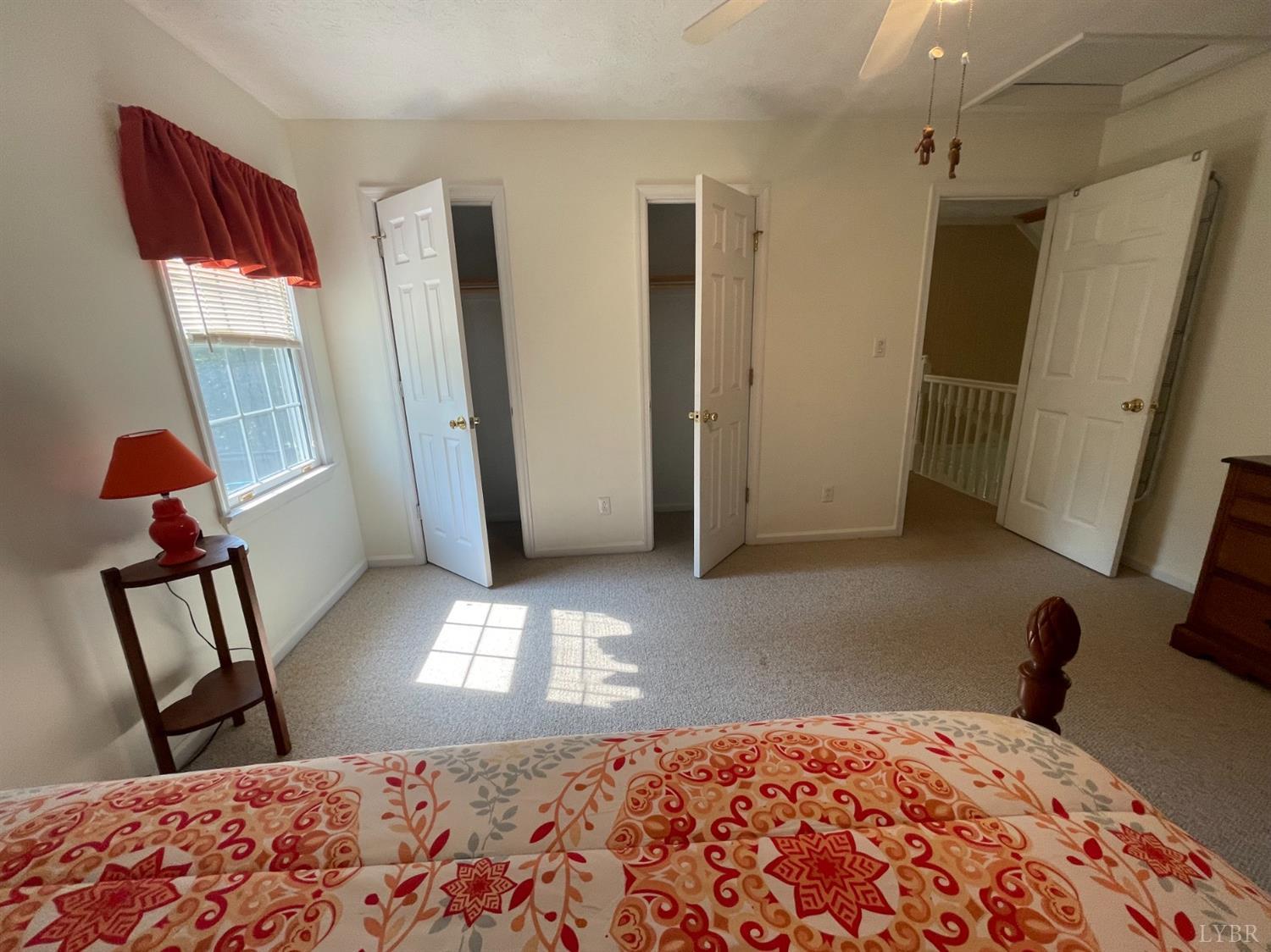 755 Bearfield Road Amherst, VA 24521 - Photo 67 of 98 a bedroom with a bed and a mirror