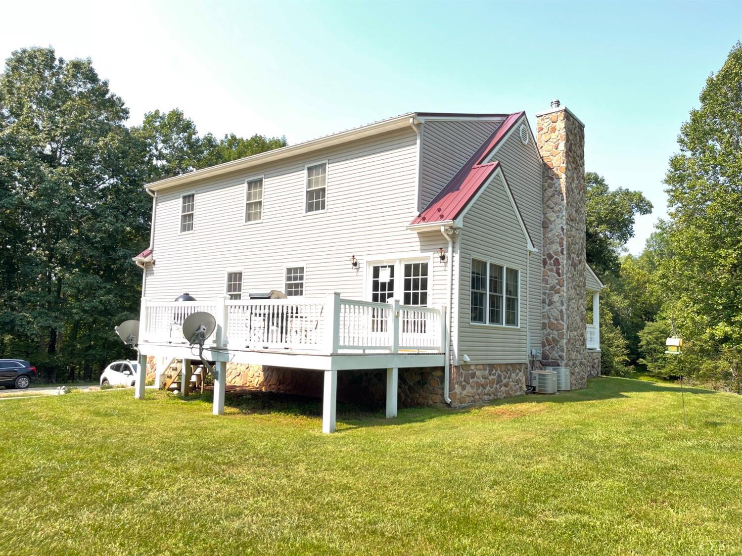 755 Bearfield Road Amherst, VA 24521 - Photo 10 of 98 a view of a house with a backyard