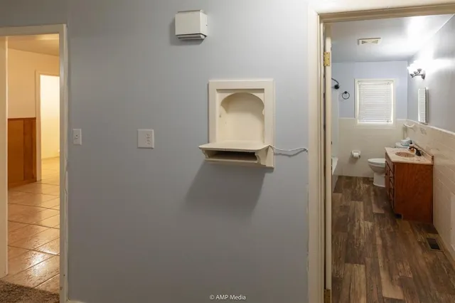a bathroom with a toilet and a sink