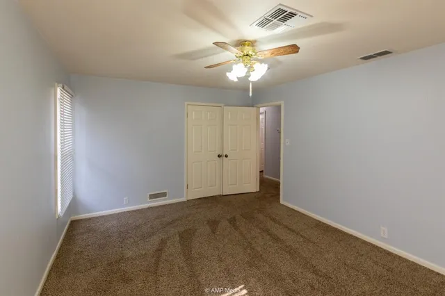 a bathroom with a sink and a window