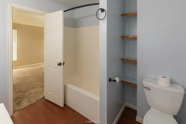 a bathroom with a sink and toilet