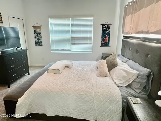 a bathroom with a sink toilet and mirror