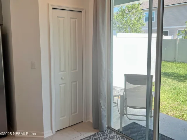 a view of a back yard of the house