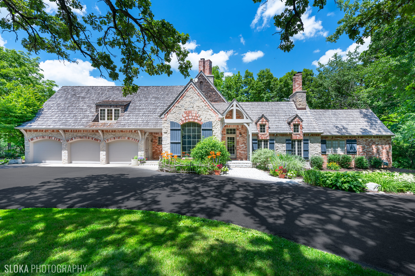 7812 East Tryon Grove Road Richmond, IL 60071 - Photo 1 of 55 a view of house with a garden