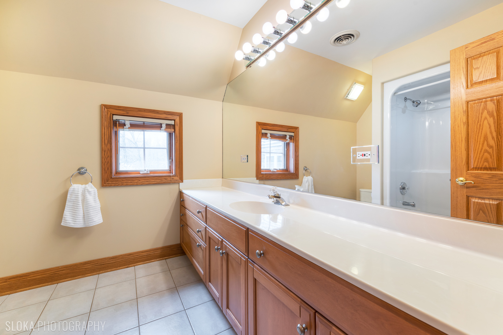 7812 East Tryon Grove Road Richmond, IL 60071 - Photo 23 of 55 a spacious bathroom with a double vanity sink a mirror and a shower