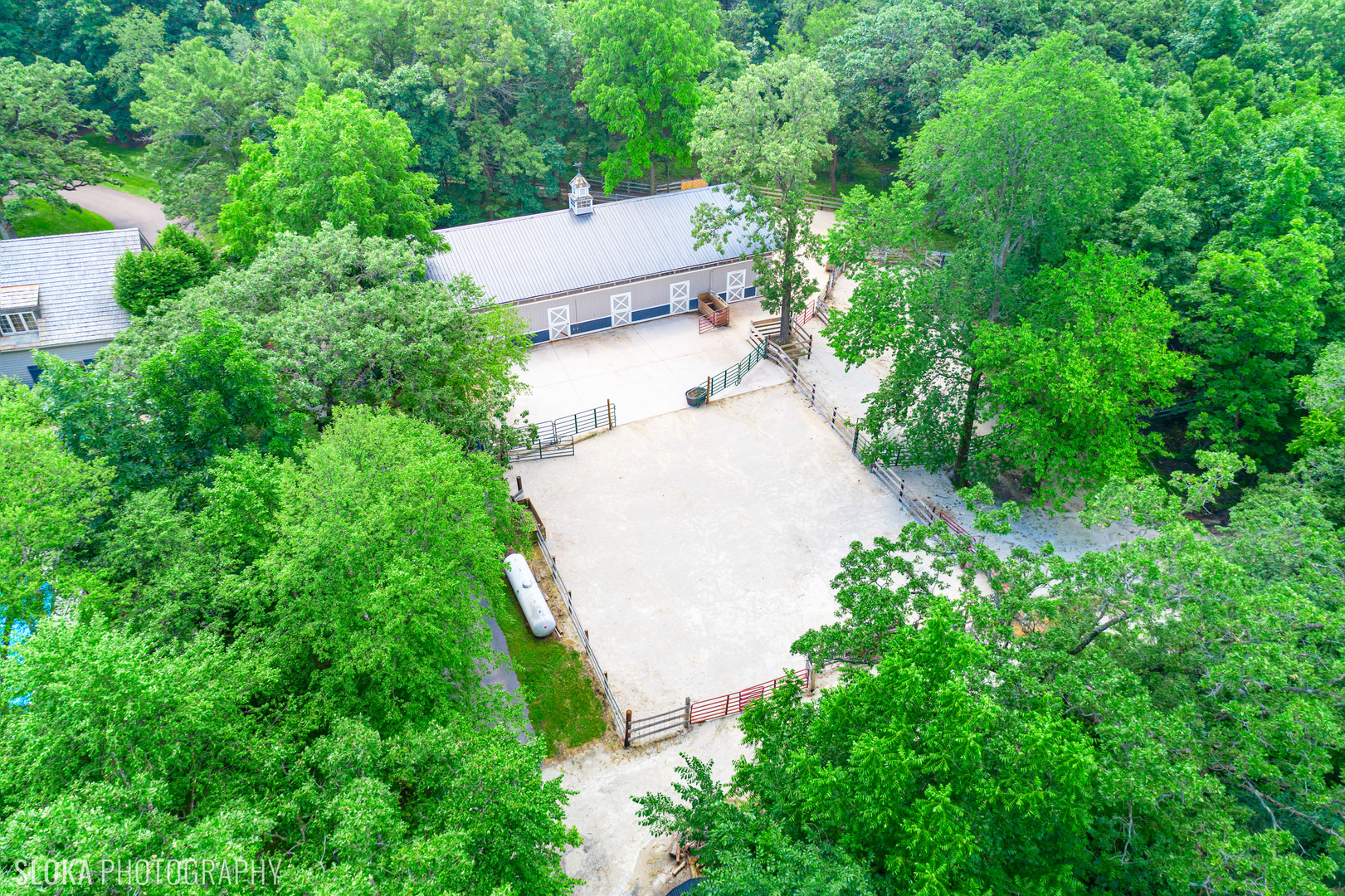 7812 East Tryon Grove Road Richmond, IL 60071 - Photo 50 of 55 an aerial view of residential house with outdoor space and trees all around