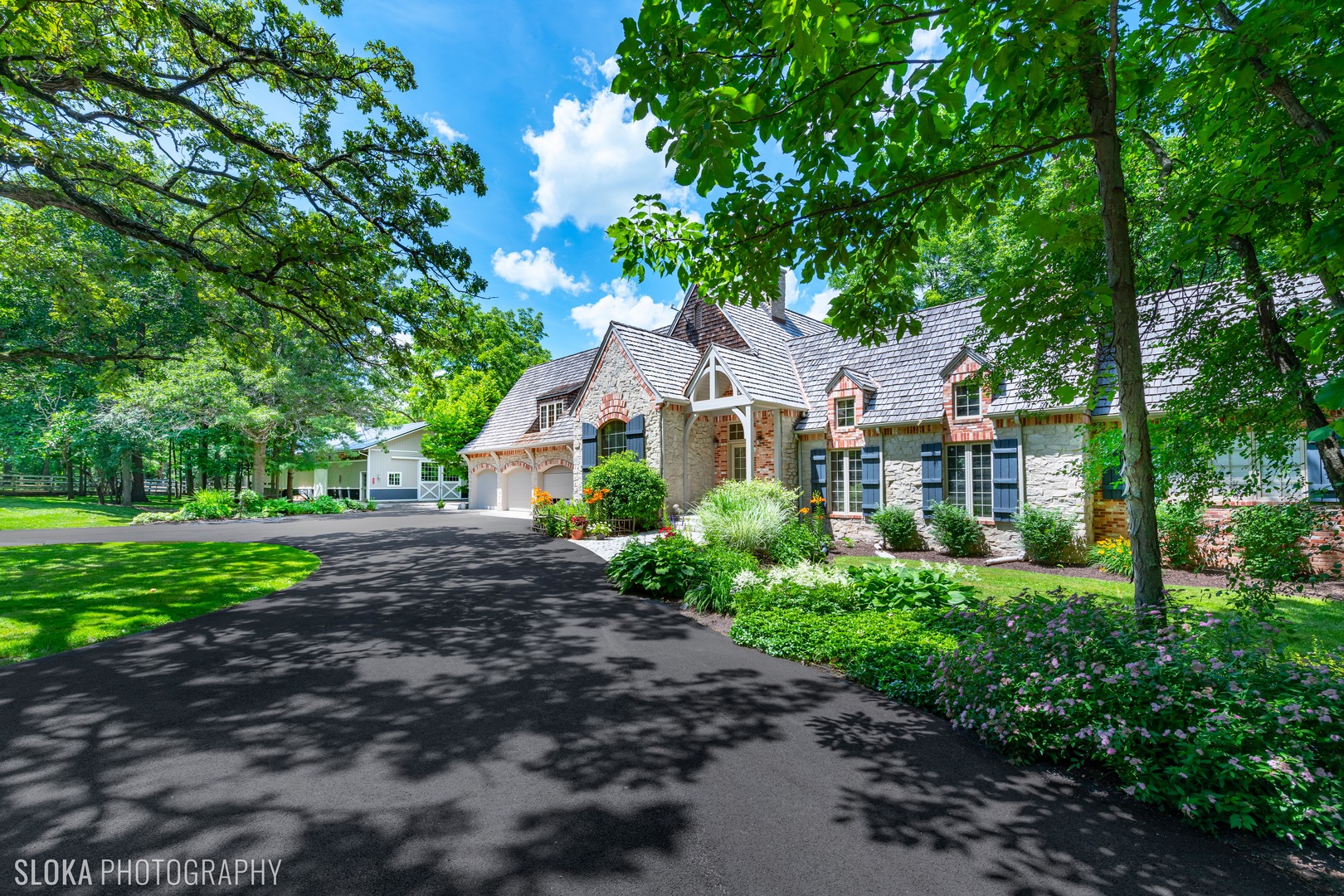7812 East Tryon Grove Road Richmond, IL 60071 - Photo 54 of 55 a front view of a house with a garden