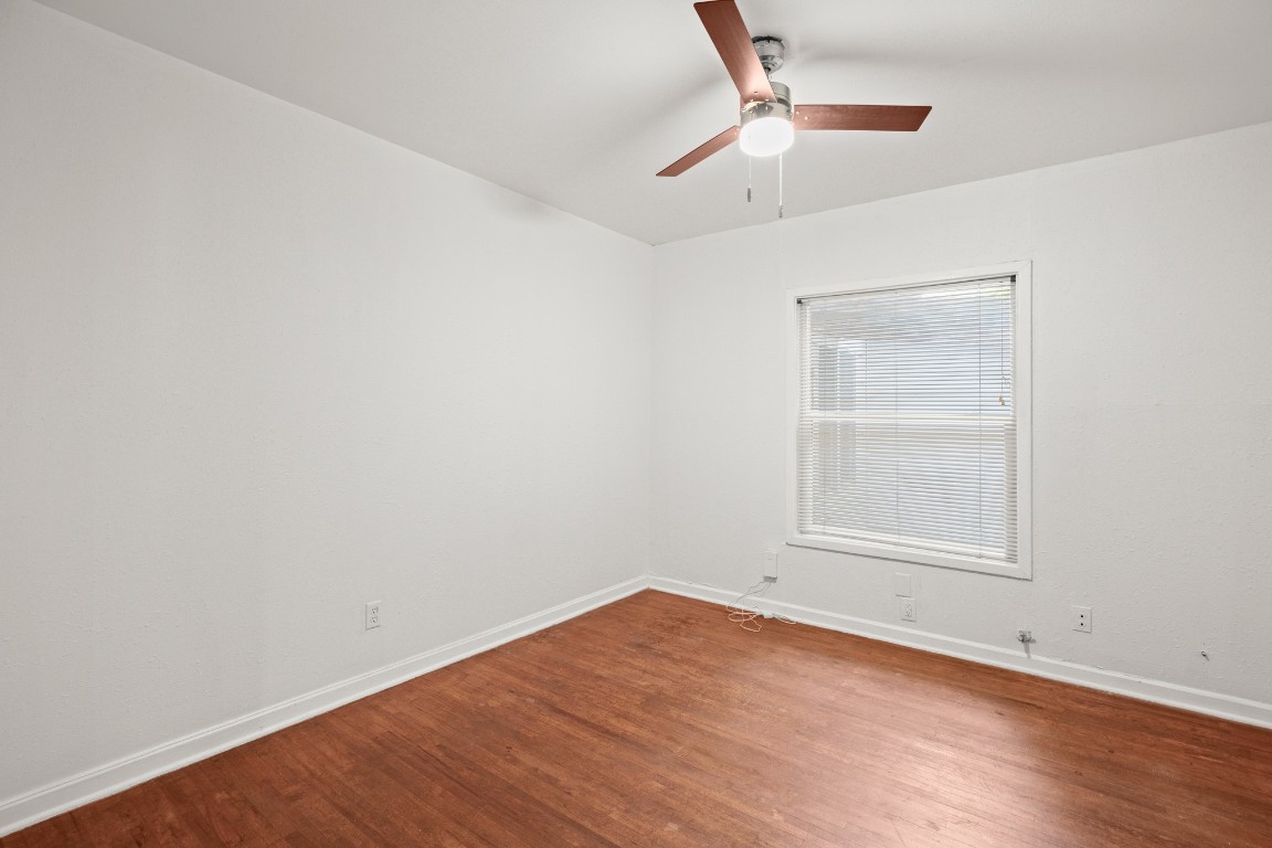 1707 Alguno Road, Unit C Austin, TX 78757 - Photo 16 of 16 featuring wood finished floors and ceiling fan