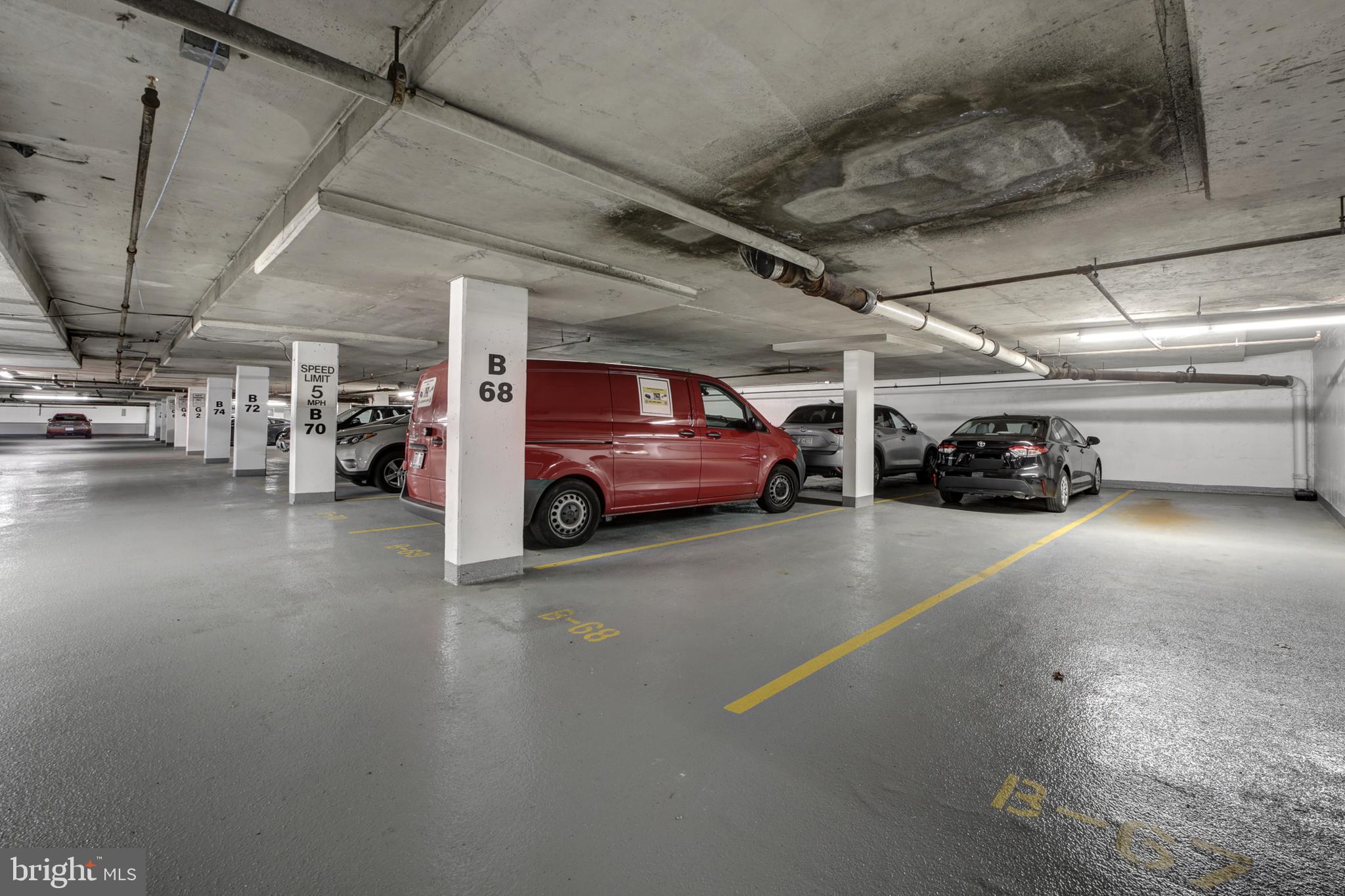 2939 Van Ness Street Northwest, Unit 1126 Washington, DC 20008 - Photo 18 of 31 a view of parking garage with cars