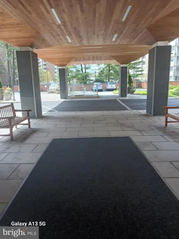 a view of a porch and garden
