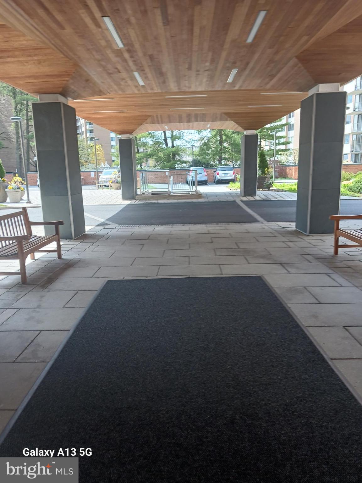2939 Van Ness Street Northwest, Unit 1126 Washington, DC 20008 - Photo 21 of 31 a view of a porch and garden