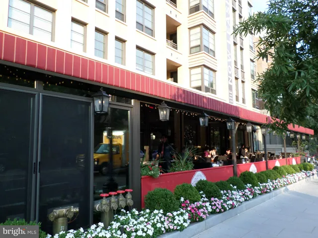 a view of a tables and chairs in a patio