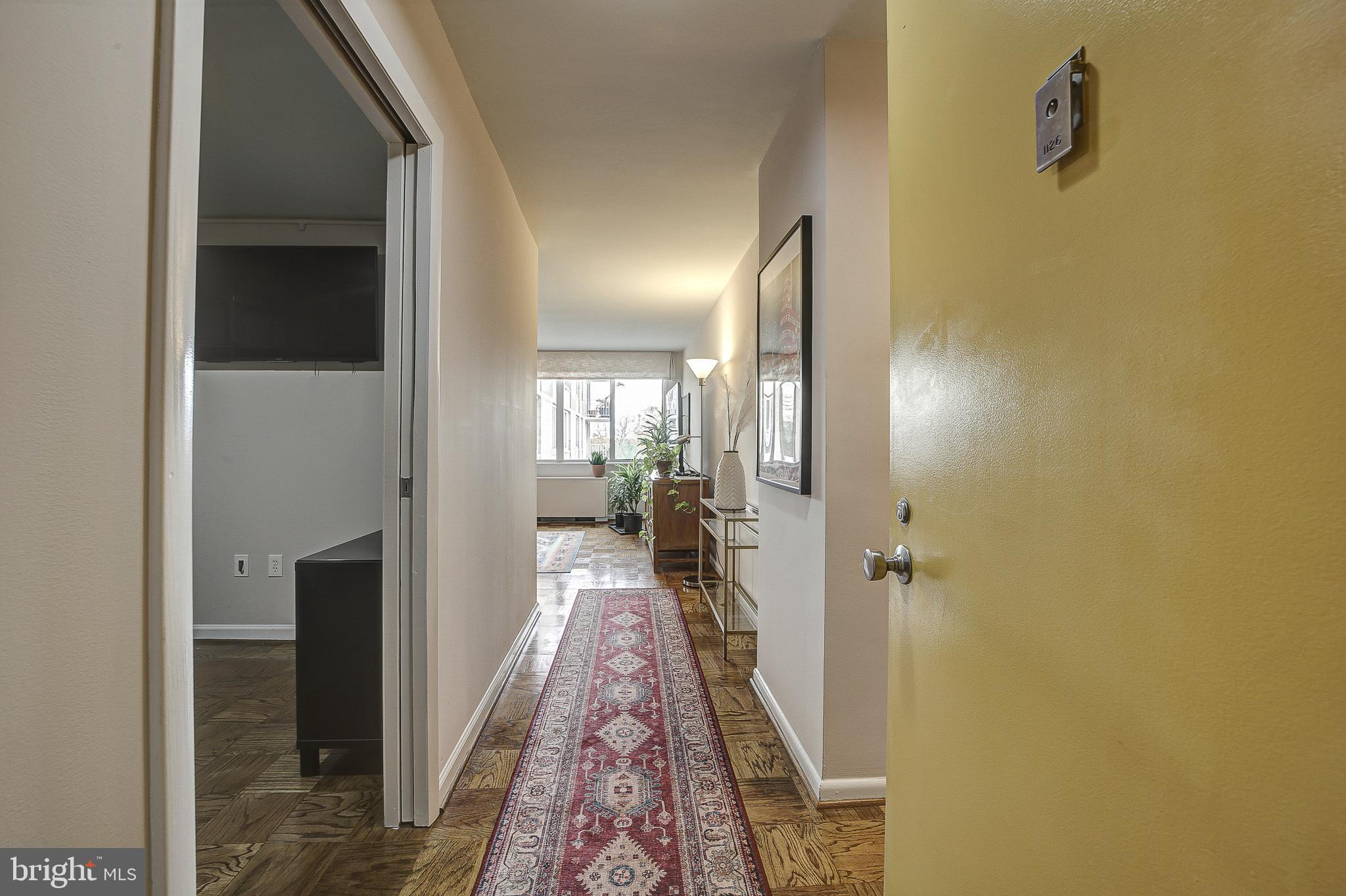 2939 Van Ness Street Northwest, Unit 1126 Washington, DC 20008 - Photo 4 of 31 a bathroom with a bathtub and shower