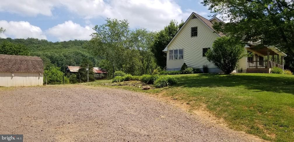 80 Rudasill Mill Road Woodville, VA 22749 - Photo 18 of 27 Side view of home, Drive Way and Shed