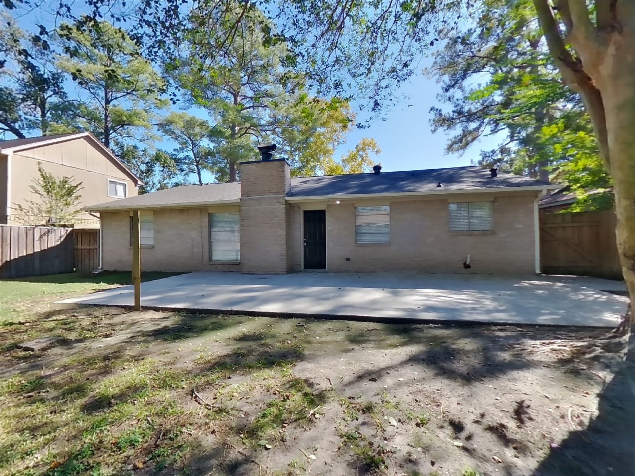 4511 Burkegate Drive Spring, TX 77373 - Photo 19 of 20 a view of a house with a yard and garage