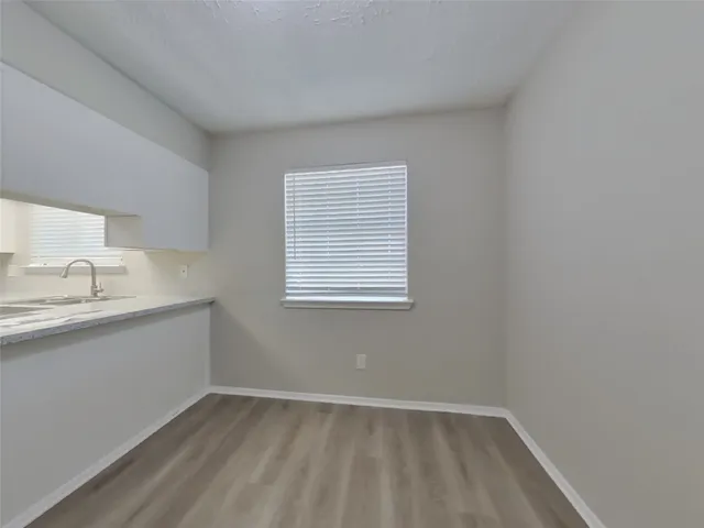 a view of a kitchen with sink and dishwasher