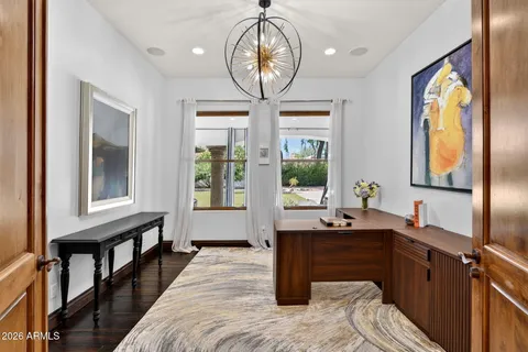 a kitchen with stainless steel appliances granite countertop a sink stove and microwave