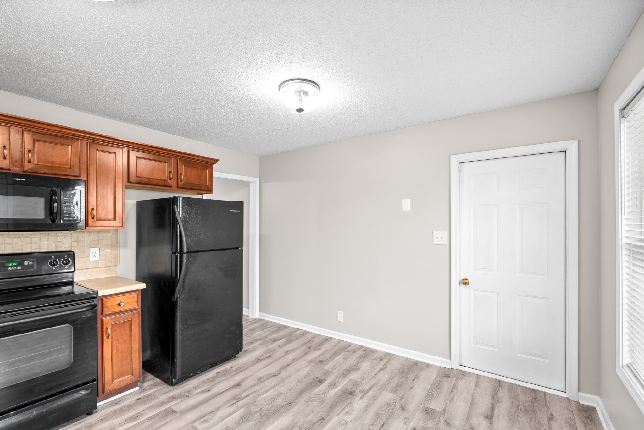 103 Meridians Way Oak Grove, KY 42262 - Photo 14 of 32 a kitchen with a refrigerator cabinet and a sink
