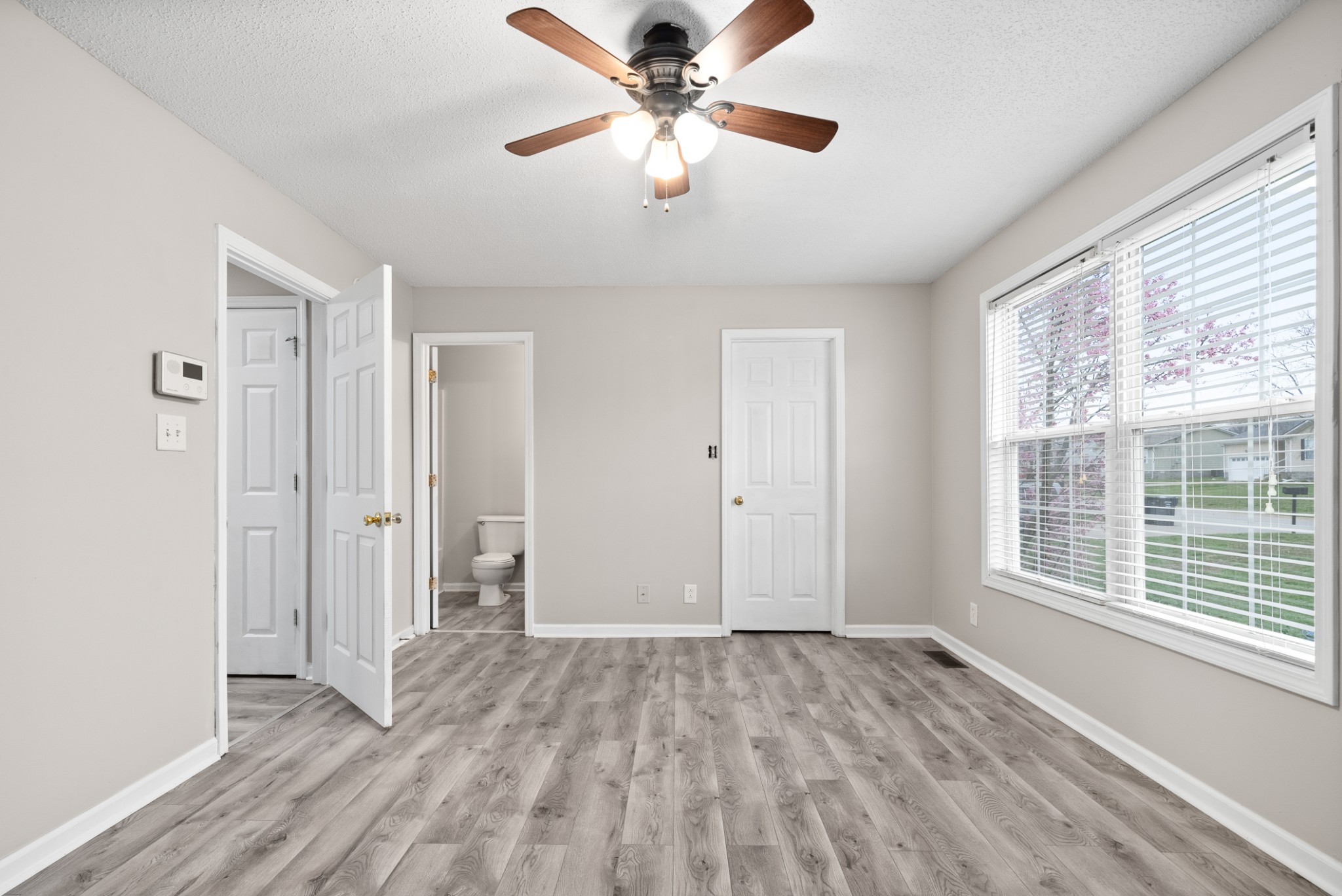 103 Meridians Way Oak Grove, KY 42262 - Photo 17 of 32 a view of a livingroom with a ceiling fan and window