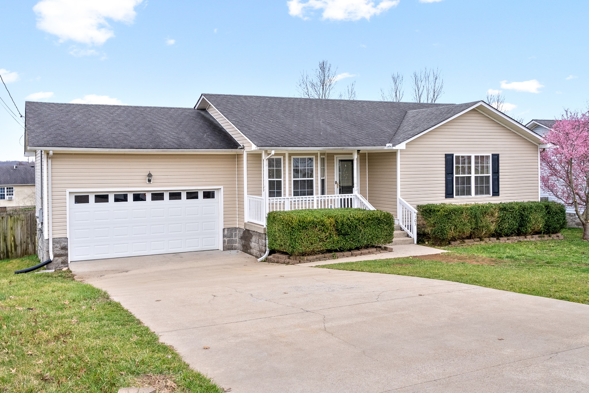 103 Meridians Way Oak Grove, KY 42262 - Photo 2 of 32 a front view of a house with a yard and garage